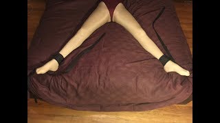 Self bondage spread eagle on the bed
