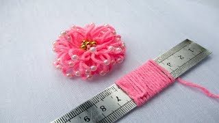 hand embroidery amazing trick# easy trick to make woolen flower with scale# wool flower