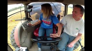 Beautiful Girl driving Case IH 305 Magnum Tractor with Kinze grain cart during Wheat Harvest 7-30-13