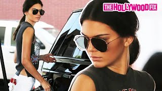 Kendall Jenner Pumps Gas In Beverly Hills Wearing Lynyrd Skynyrd Shirt 5.10.15 - TheHollywoodFix.com