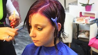 A short haircut and a purple hair color for a great new look