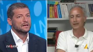 Romano (PD) vs Travaglio: 'Ti do una notizia, non è vero che nessun trafficante viene ...