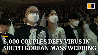 In sickness and health: 6,000 couples wed at church event in South Korea despite coronavirus outbre