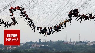245 people jump off a bridge together - BBC News