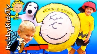 Giant CHARLIE BROWN Surprise SMASH EGG Adventure! HobbyKids Visit a Lucy Booth