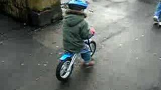 Child on JD Bug Trainer Running Bike