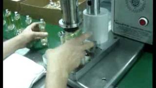 Swastik's 8 Head Perfume Glass Bottle Filling Line.