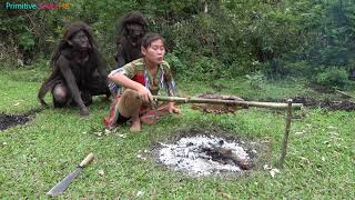 Primitive life - ethnic girl catch fish and grill fish meet forest people beggar