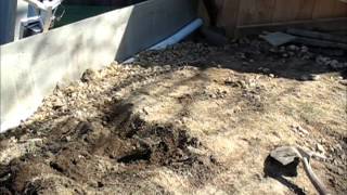 Anchoring a retainer wall
