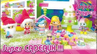 Les Super Héroïnes Pinypon aident le Père Noël à distribuer tous les cadeaux dans la ville Pinypon !