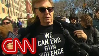 Paul McCartney references John Lennon at march