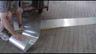 Temporary muffler repair patch with aluminum sheet