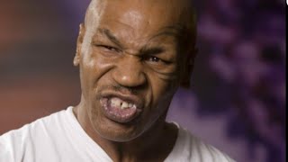 (WOW) "IRON" MIKE TYSON KNOCKS OUT GUY AT CHARITY EVENT WITH OVER RIGHT & HOLDS HIM UP AT SAME TIME