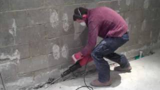 Darren's giving it some with a Hilti Bre