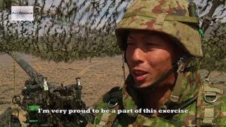 U.S. Soldiers and Japan Self-Defense Forces in Field Artillery Training