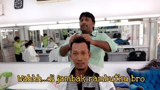 Potong rambut plus pijat super cepat