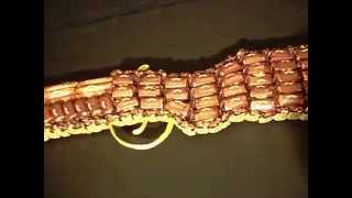 Подарок из конфет "Ружьё"