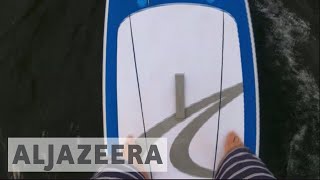 Stand up paddle boarding fighting for control of the sport