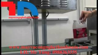 Máy dán màng seal tự động