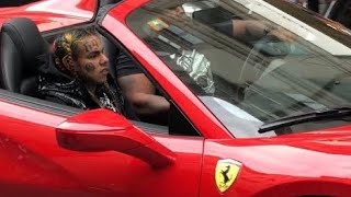6ix9ine riding in a Ferrari 488 in Milan