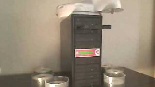 The fastest CD DVD automated duplicator: Dexterix robot working with an 8 targets Wytron tower