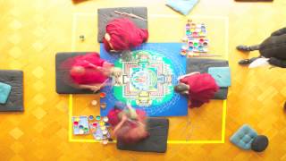 Monks of the Drepung Gomang Monastery create a sand mandala of the Buddha Amitayus