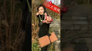 Китаянка стреляет из рогатки как снайпер