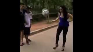 Guy plays soccer with heels!