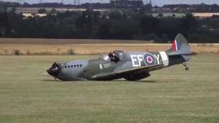 Dramatic moment a replica Spitfire lands without undercarriage
