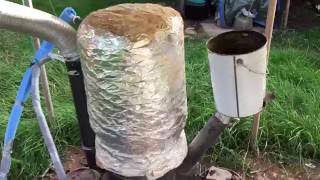 Rocket stove water heater for our copper hot tub
