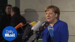 Merkel shares update before final day of coalition negotiations - Daily Mail