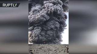 Hikers walk mere meters from huge pillar of volcanic ash!