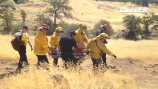 Chico Firefighters and Medics help a woman with an injured ankle down Manzanita Trail in Upper Bidwe