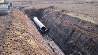 Восстановление и чистка водостоков экскаватором. CAT 312C.