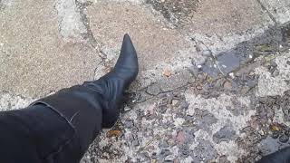 Wet high heel stiletto leather boots on the beach A short requested video