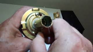 How to remove door knob with no visible screws.
