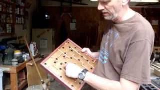 Make a wood labyrinth or marble maze