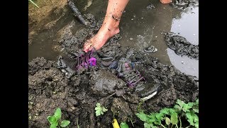 Her Adidas Ultraboost trashed in deep mud