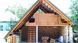 Сеновал - дровник из оцилиндрованного бревна / Hayloft of log
