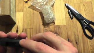 Посылки с AliExpress: Брелок Tomahawk TW-9010 и объектив Canon A3200 A3300