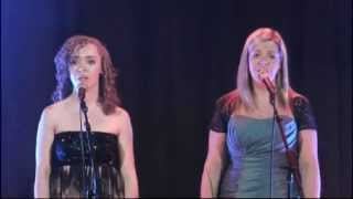 Ajay Lister, with her sister, Kimberley, singing, 'By My Side' in acapella from, 'Godspell'.