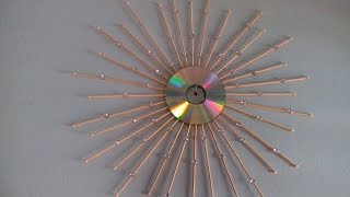 Old CD sunburst wall hanging.DIY wall decor ideas.