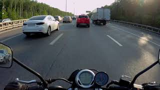 Bajaj Avenger 220 street. On highway with passenger