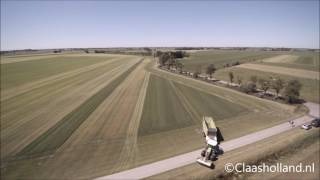 Claas Arion 650 met Claas Cargos 8500 met DWM onderstel.