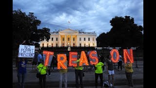 Anti-Trump protesters shout "LOCK HIM UP!" as Trump arrives at the White House