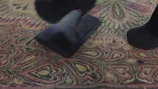 Girl trample netbook with muddy high heels boots