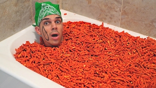 HOT CHEETOS & TAKIS FUEGO BATH CHALLENGE ( DOING YOUR DARES )