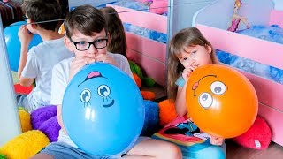 Alisa and Nikita playing with Balloons