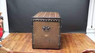 Restauration client  d'une malle  courrier monogram haute