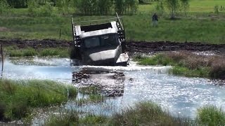 Russian army truck Ural 4320 runs ford